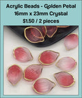 Pile of 16 x 23mm acrylic petal charms in red with gold-tone edges