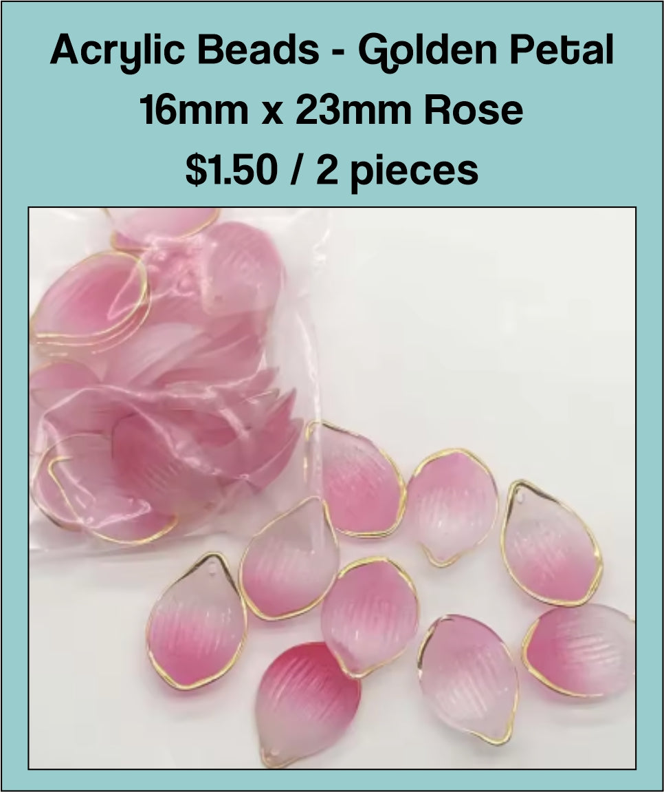Pile of 16 x 23mm acrylic petal charms in pale rose with gold-tone edges