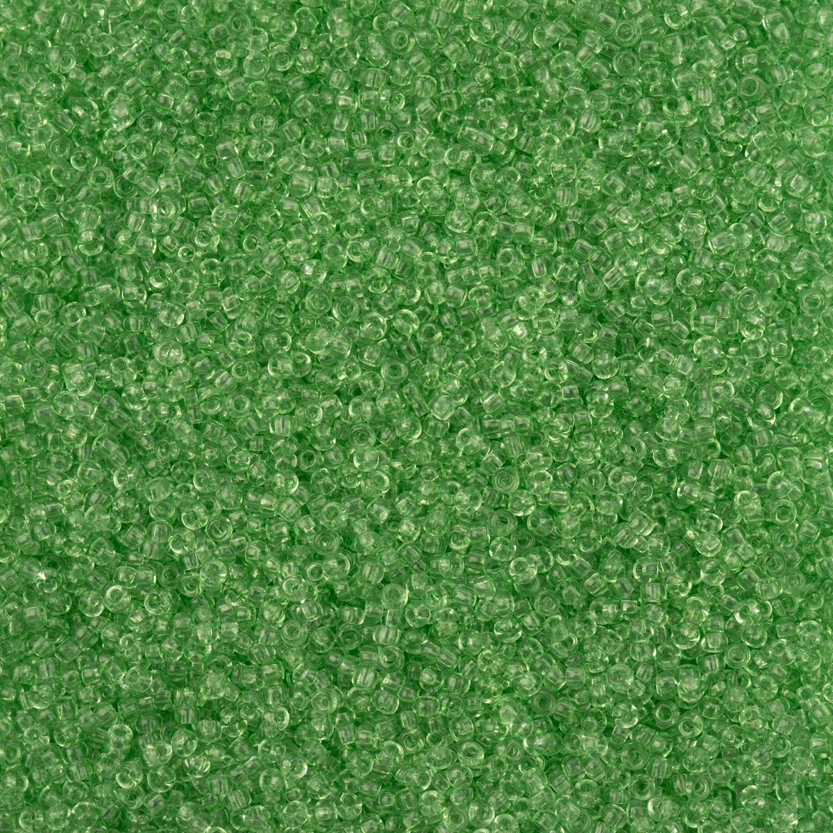 Close-up of Preciosa 11/0 Czech glass seed beads in green crystal solgel