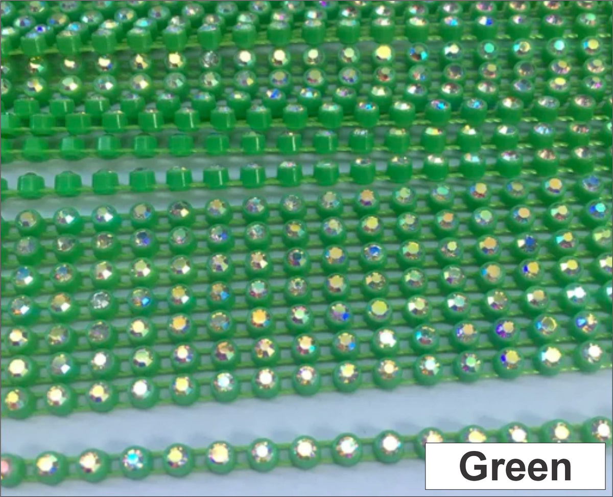 Close-up of rows of ss6 plastic cup rhinestone banding in green with AB crystal stones
