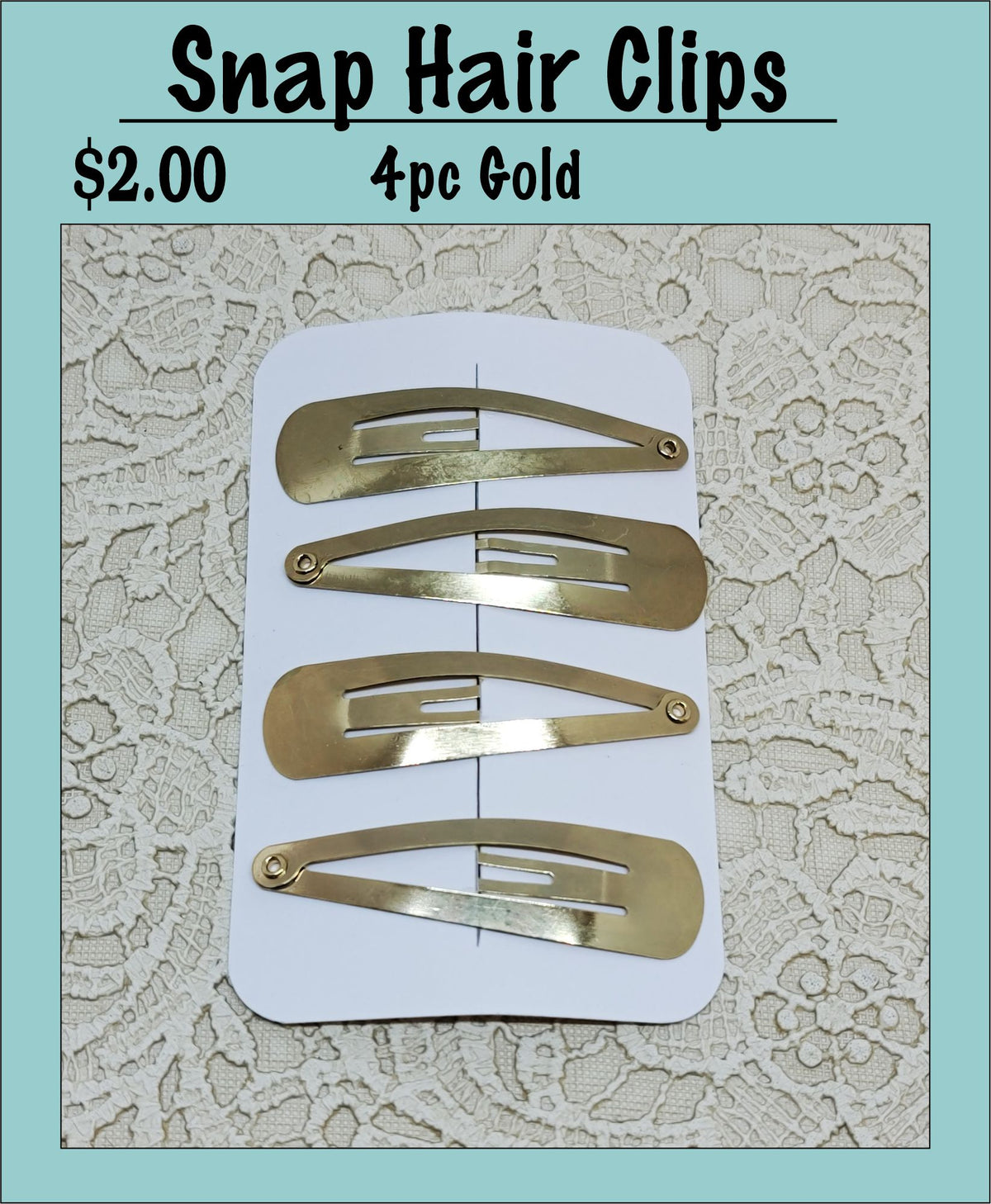 Card of four gold snap hair clips under a Snap Hair Clips heading