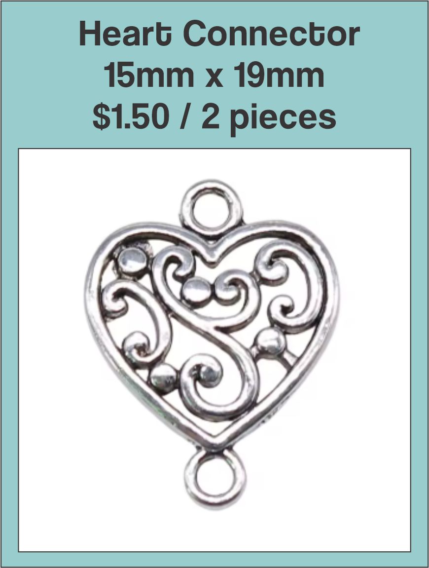 Silver-tone 15 x 19mm heart connector with a swirl pattern and loops at both ends