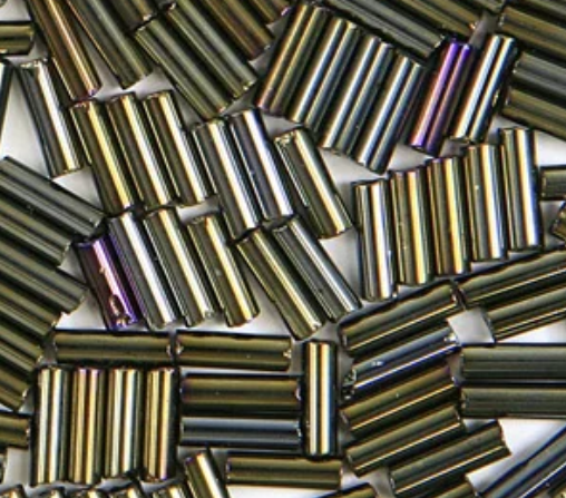 Close-up of loose 6mm Preciosa Czech glass bugle beads in iris brown