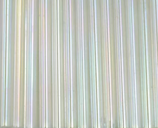 Rows of 30mm Preciosa Czech glass bugle beads in iris crystal