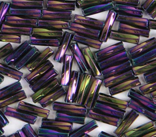 Close-up of loose twisted 6mm Preciosa Czech glass bugle beads in iris purple