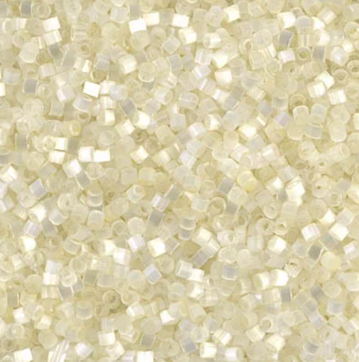 Close-up of Miyuki Delica 11/0 DB0672 cylinder beads in ivory with a silk satin sheen