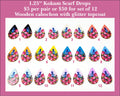 Twelve pairs of 1.25 inch kokum scarf drop cabochons (cabs) with pink roses on black, white and bright colours