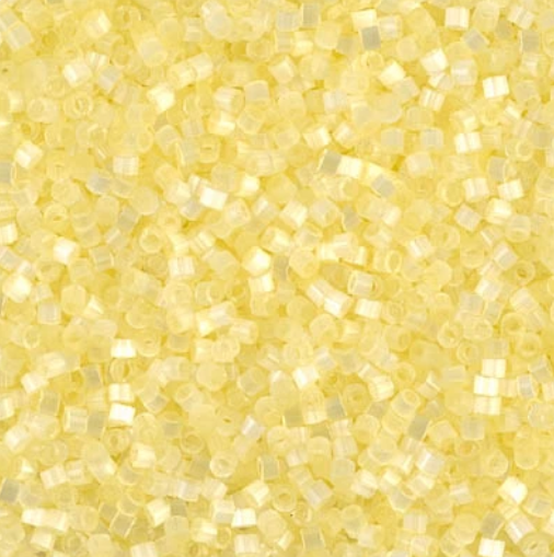 Close-up of Miyuki Delica 11/0 DB0823 cylinder beads in light yellow with a silk satin sheen