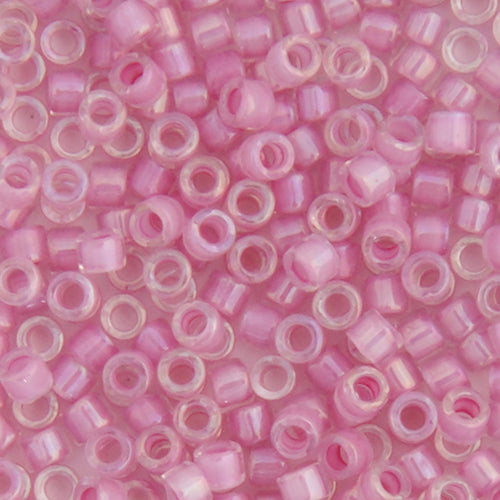 Close-up of Miyuki Delica 11/0 DB0072 cylinder beads in pale lilac with an AB rainbow finish