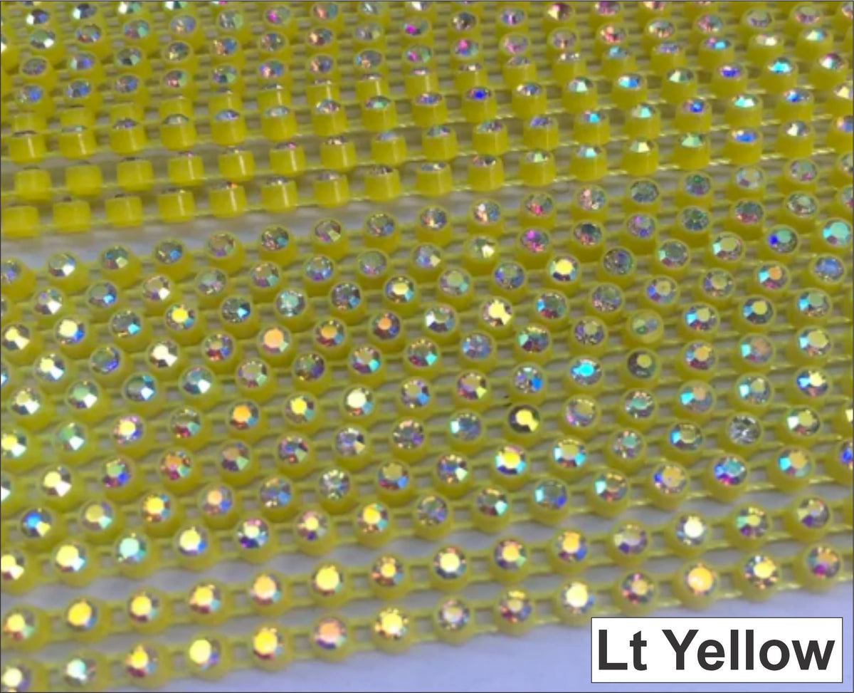 Close-up of rows of ss6 plastic cup rhinestone banding in light yellow with AB crystal stones