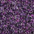 Close-up of Preciosa 11/0 Czech glass seed beads in colour-lined mauve