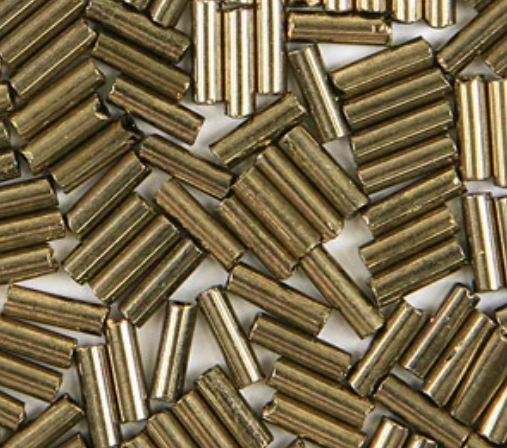 Close-up of loose 6mm Preciosa Czech glass bugle beads in metallic light bronze