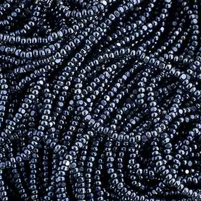 Close-up of strung Preciosa 13/0 true cut charlotte beads in metallic gunmetal