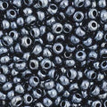Close-up of Preciosa 11/0 Czech glass seed beads in opaque metallic gunmetal