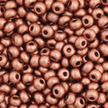 Close-up of Preciosa 11/0 Czech glass seed beads in metallic light copper