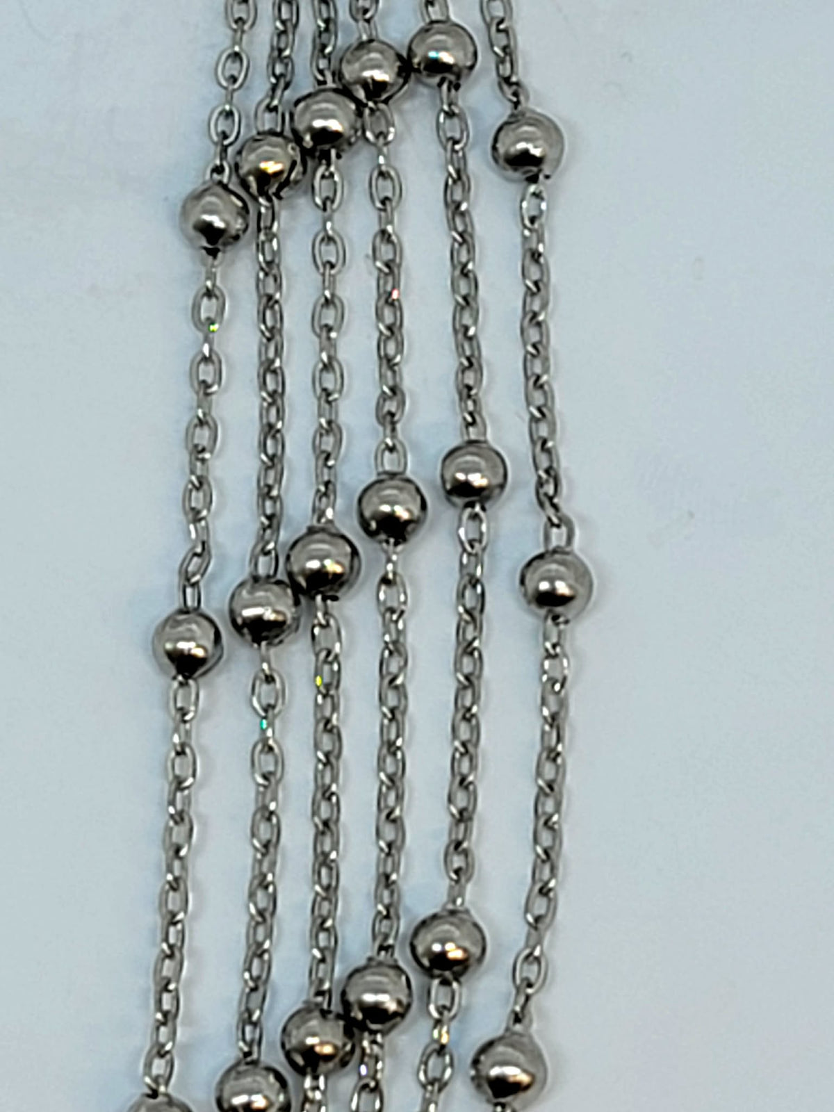 Silver-tone 2mm stainless steel chain with small round beads spaced along it