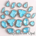 Sew-on crystal rhinestones in aquamarine opal, in 10 shapes with silver claw settings