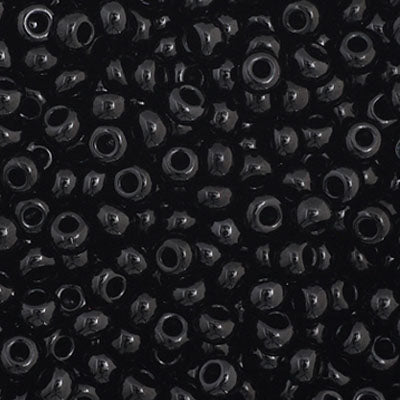 Close-up of Preciosa 11/0 Czech glass seed beads in opaque black