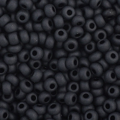 Close-up of Preciosa 11/0 Czech glass seed beads in opaque black matte