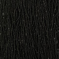 Close-up of strung Preciosa 13/0 true cut charlotte beads in opaque black