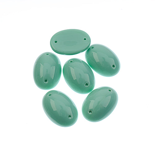 Five 13 x 18mm Czech glass oval cabochons in opaque blue on a white background