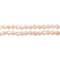 Two strands of Crystal Lane 4mm faceted glass bicone beads in opaque cream AB