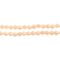 Two strands of Crystal Lane 4mm faceted glass bicone beads in opaque cream