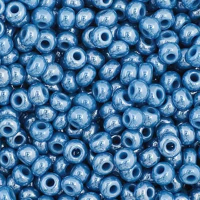 Close-up of Preciosa 11/0 Czech glass seed beads in opaque dark blue with a luster finish
