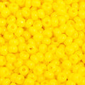 Close-up of Preciosa 11/0 Czech glass seed beads in opaque lemon yellow