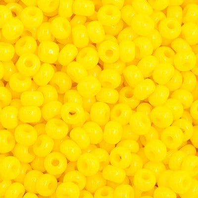 Close-up of Preciosa 11/0 Czech glass seed beads in opaque lemon yellow