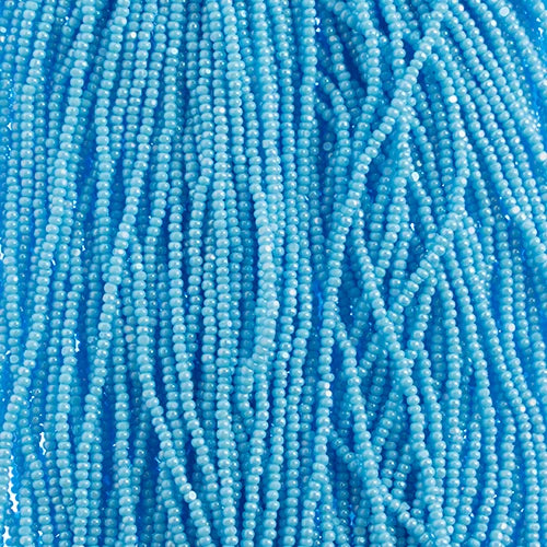Close-up of strung Preciosa 13/0 true cut charlotte beads in opaque light blue with a luster finish