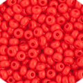 Close-up of Preciosa 11/0 Czech glass seed beads in opaque light red