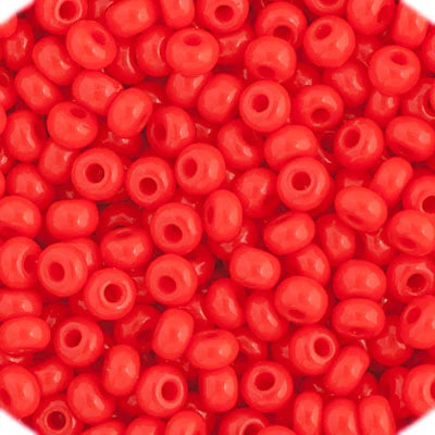 Close-up of Preciosa 11/0 Czech glass seed beads in opaque light red