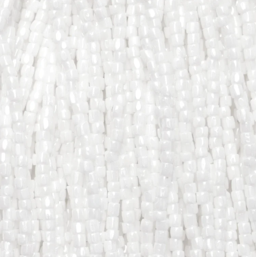 Close-up of strung Preciosa 9/0 three-cut glass seed beads in opaque white with a luster finish