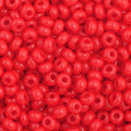 Close-up of Preciosa 11/0 Czech glass seed beads in opaque medium red