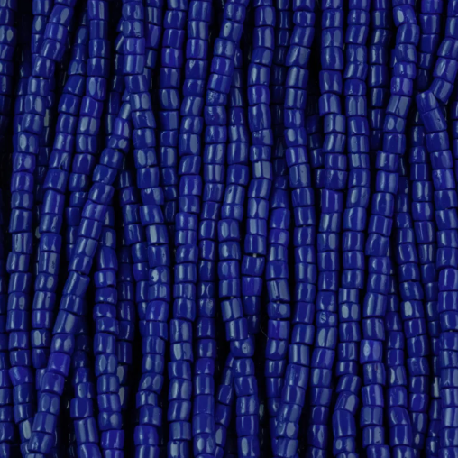Close-up of strung Preciosa 9/0 three-cut glass seed beads in opaque navy blue