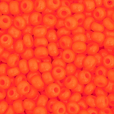 Close-up of Preciosa 11/0 Czech glass seed beads in opaque orange