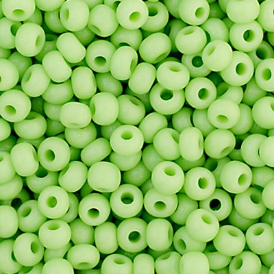 Close-up of Preciosa 11/0 Czech glass seed beads in opaque pale green
