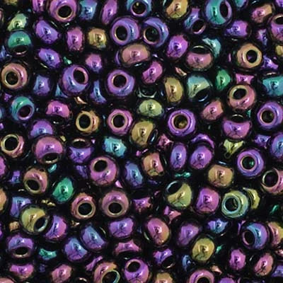 Close-up of Preciosa 11/0 Czech glass seed beads in opaque purple with an AB rainbow finish