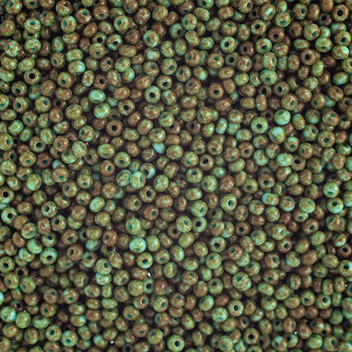 Close-up of Preciosa 11/0 Czech glass seed beads in opaque travertine on turquoise