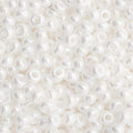 Close-up of Preciosa 11/0 Czech glass seed beads in opaque white with a luster finish