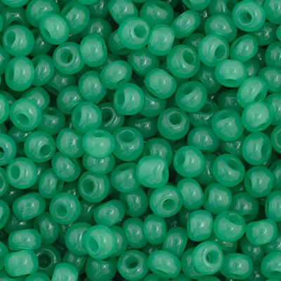 Close-up of Preciosa 11/0 Czech glass seed beads in opaque green