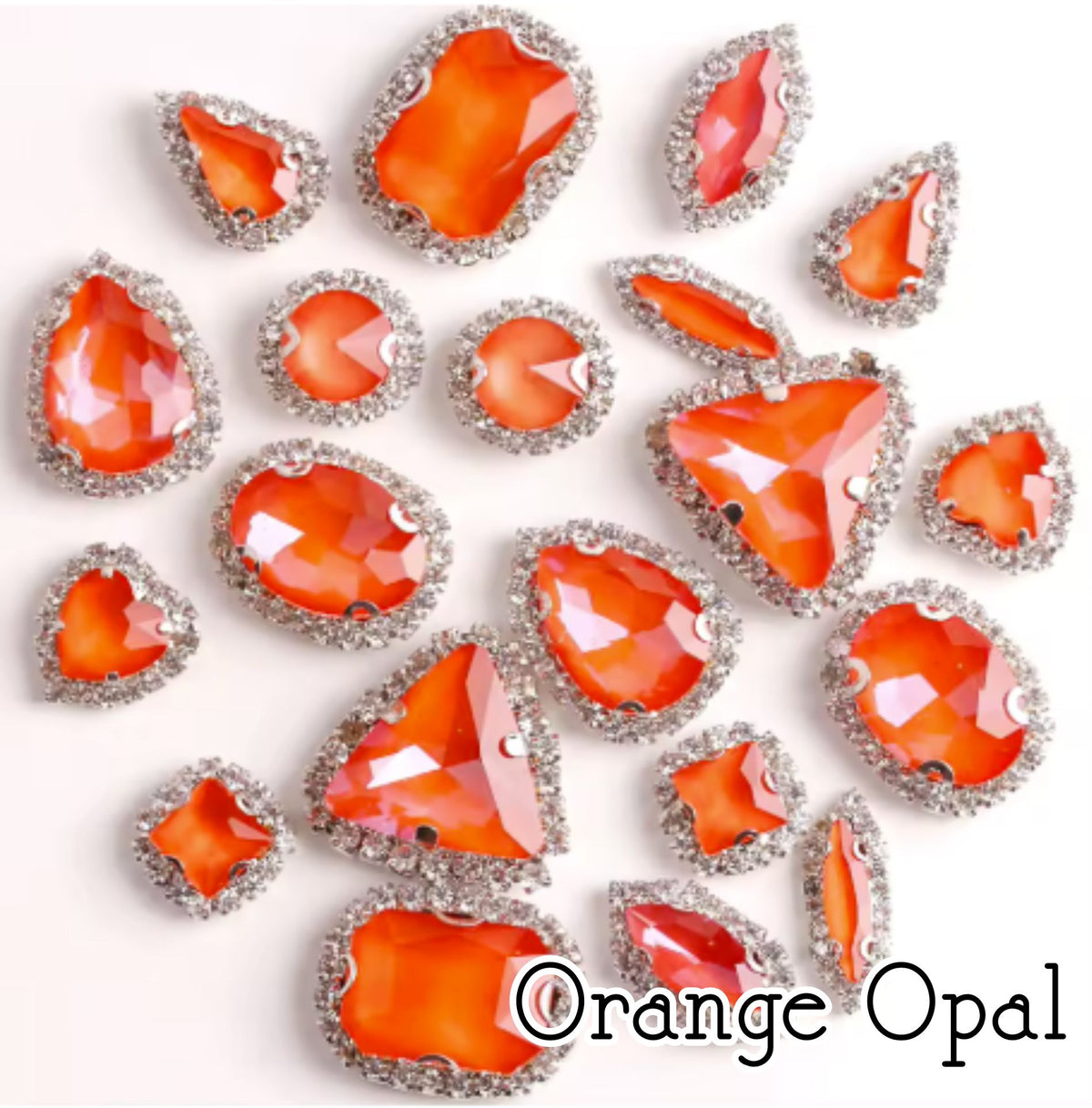 Sew-on crystal rhinestones in orange opal, in 10 shapes with silver claw settings