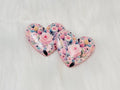 Pair of 37mm resin heart cabochons (cabs) in pink with pastel roses and dark leaves