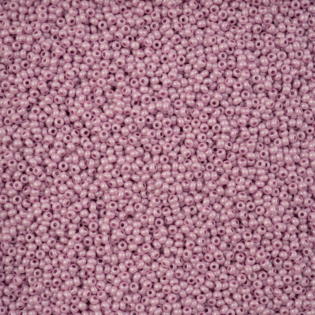 Close-up of Preciosa 11/0 Czech glass seed beads in pearl lilac chalk terra with a luster finish