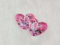 Pair of 37mm resin heart cabochons (cabs) in hot pink with pink roses and black leaves