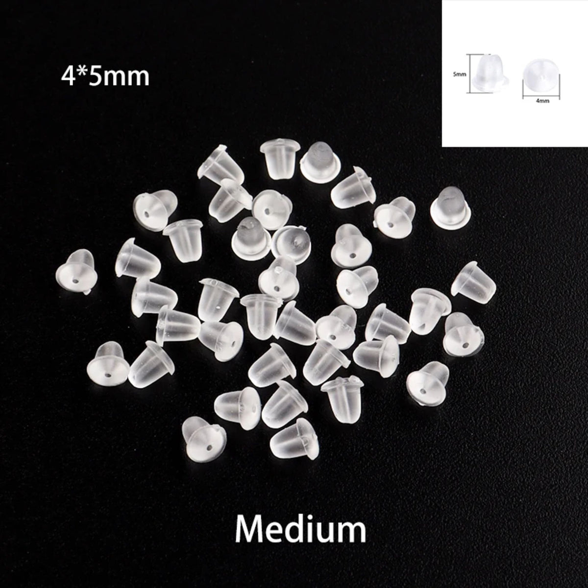 Clear 4 x 5mm rounded rubber earring backs on black, labelled Medium
