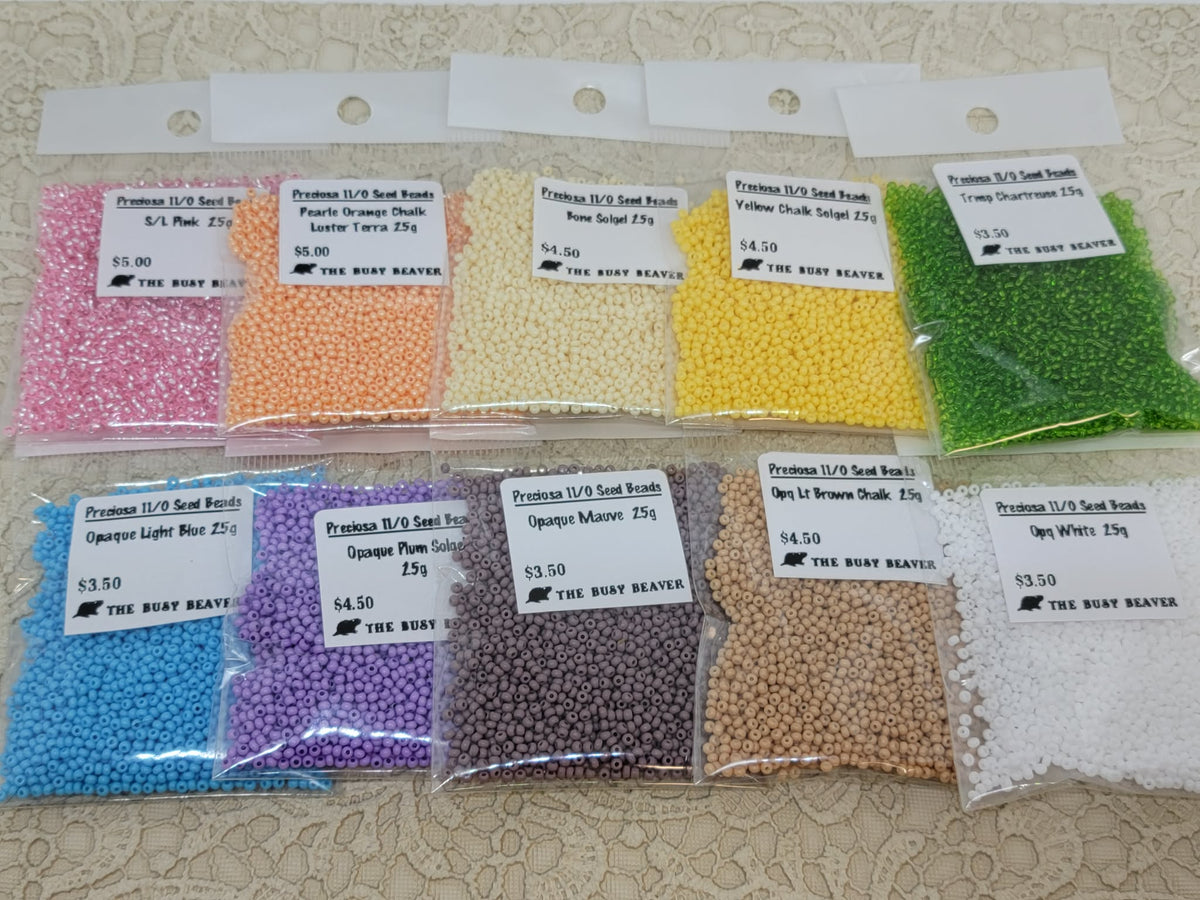Ten 25g bags of Preciosa 11/0 seed beads in pastels: pink, peach, cream, yellow, green, blue, lilac, mauve, tan, white