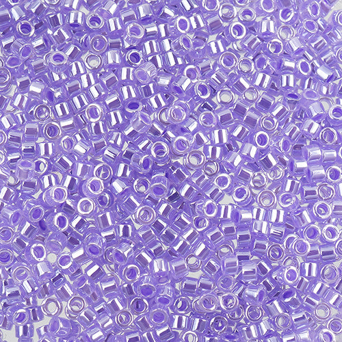Close-up of Miyuki Delica 11/0 DB0249 cylinder beads in purple with a luster finish
