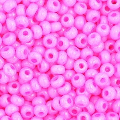Close-up of Preciosa 11/0 Czech glass seed beads in dyed opaque rose